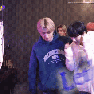 Two Men Standing Next To Each Other One In Balenciaga Hoodie GIF