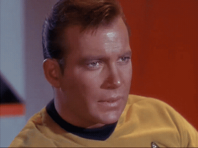 Two Men Standing Next to Each Other Saying Please Captain Not in Front of the Klingons
