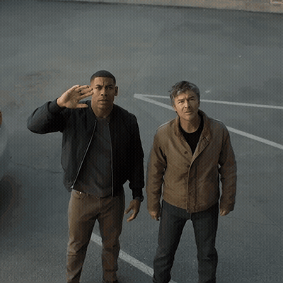 Two Men Standing Next To Each Other Saying What's That GIF