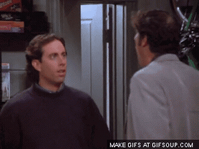 Two Men Standing Next To Each Other GIF
