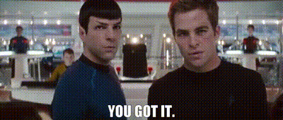 Two Men Standing Next To Each Other GIF
