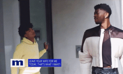 Two Men Standing Next To Each Other With A Sign That Says " Leave Your Wife For Me Today " GIF