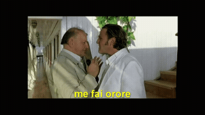 Two Men Standing Next To Each Other With Me Fai Orore In Yellow GIF