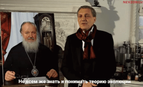 Two Men Standing Next To Each Other With Nevzorov Written On The Top Right GIF