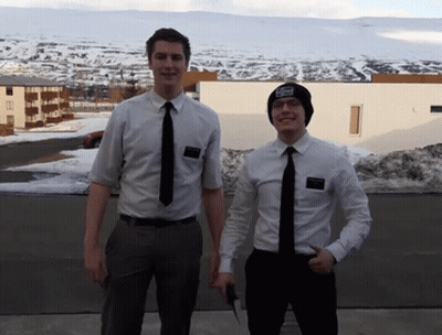 Two Men Standing Next To Each Other With One Wearing A Hat That Says ' I Love You ' GIF