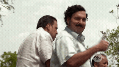 Two Men Standing Next To Each Other With SD Logo GIF
