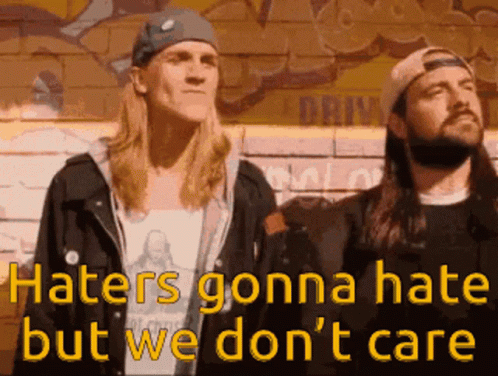 Two Men Standing Next To Each Other With The Words Haters Gonna Hate But We Don 'T Care On The Bottom GIF