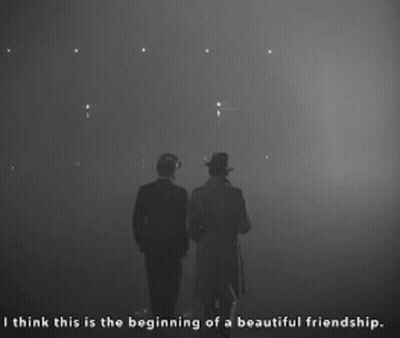 Two Men Standing Next To Each Other With The Words I Think This Is The Beginning Of A Beautiful Friendship Below Them GIF