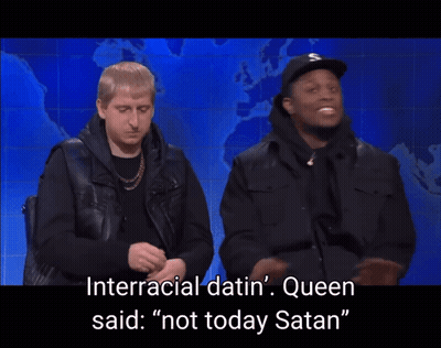 Two Men Standing Next To Each Other With The Words " Interracial Datin ' Queen Said " On The Bottom GIF