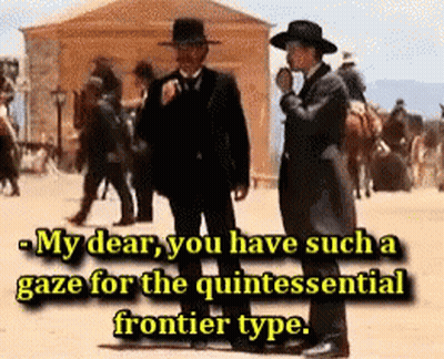 Two Men Standing Next To Each Other With The Words " My Dear You Have Such A Gaze For The Quintessential Frontier Type " GIF