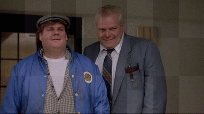 Two Men Standing Next To Each Other With The Words Schnikes Written On The Bottom GIF