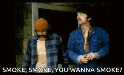 Two Men Standing Next To Each Other With The Words Smoke , Smoke , You Wanna Smoke Written Below Them . GIF