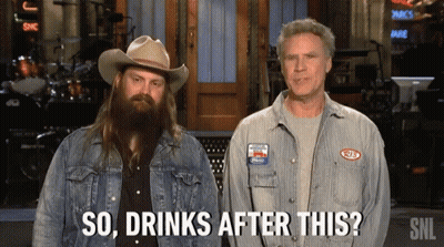 Two Men Standing Next To Each Other With The Words So Drinks After This Behind Them GIF