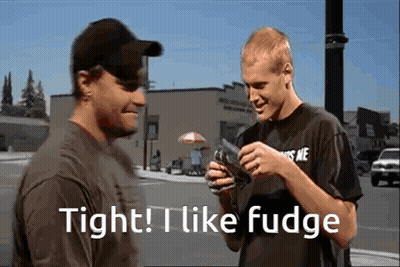 Two Men Standing Next To Each Other With The Words Tight I Like Fudge Written On The Bottom GIF