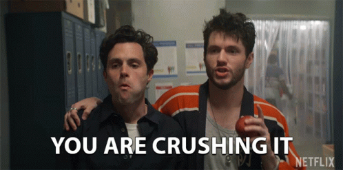Two Men Standing Next To Each Other With The Words " You Are Crushing It " On The Screen GIF