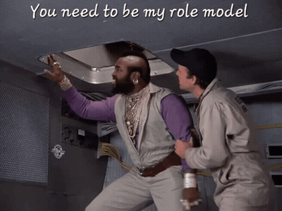 Two Men Standing Next To Each Other With The Words You Need To Be My Role Model GIF