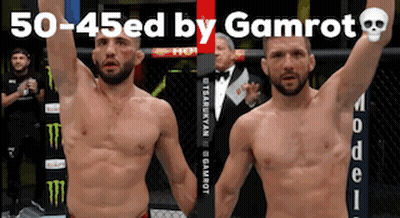 Two Men Standing Next To Each Other With Their Arms In The Air And The Words 50-45Ed By Gamrot GIF