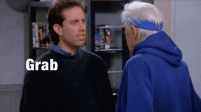 Two Men Standing Next To Each Other GIF