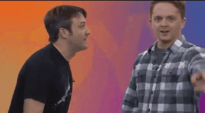 Two Men Standing Next To Japan GIF