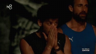 Two Men Standing Next To TV8 Logo GIF