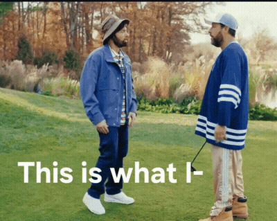 Two Men Standing On A Grassy Field With The Words This Is What I- GIF