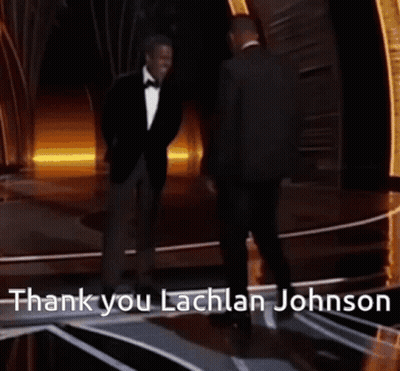 Two Men Standing On A Stage With The Words Thank You Lachlan Johnson On The Bottom GIF