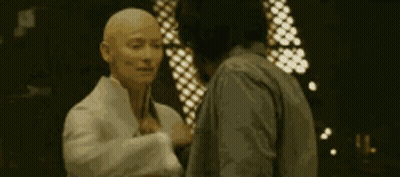Two Men Standing On Balcony GIF