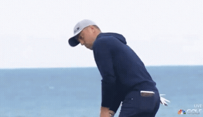 Two Men Standing On Golf Course GIF