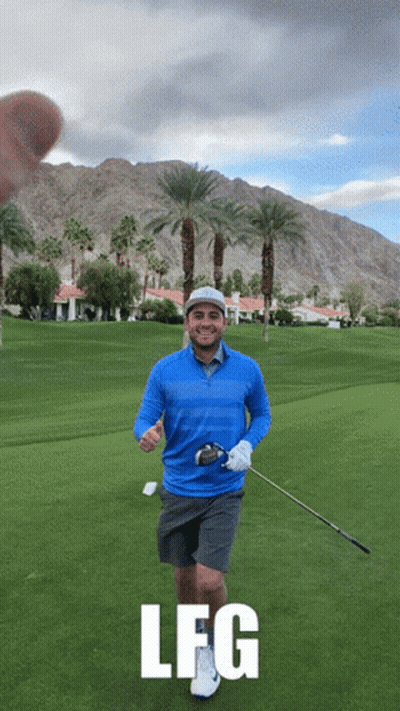 Two Men Standing On Golf Course With Golf Bag GIF