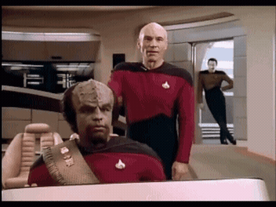 Two Men Standing On Spaceship GIF