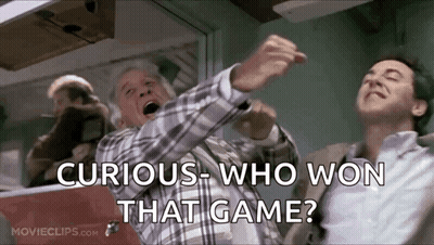 Two Men Standing, One Asking Curious Who Won That Game GIF