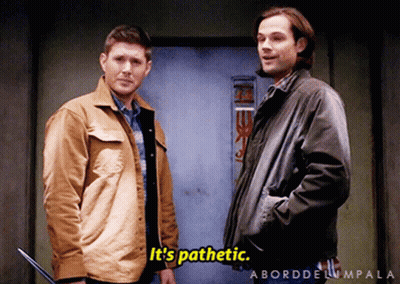 Two Men Standing One Saying It's Pathetic