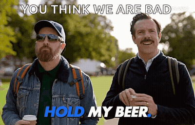 Two Men Standing One Saying You Think We Are Bad Hold My Beer GIF
