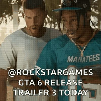 Two Men Standing One Wearing Blue Manatees Shirt GIF