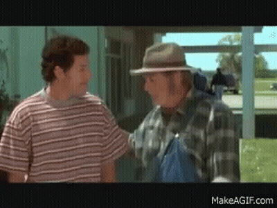 Two Men Standing One Wearing Hat GIF