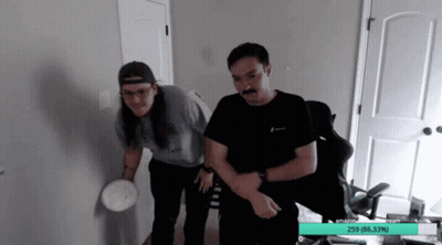 Two Men Standing One With Mustache One With Long Hair GIF