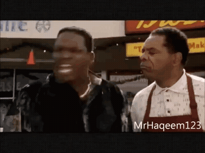Two Men Standing Outside Restaurant GIF