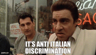 Two Men Standing Saying It's Anti Italian Discrimination GIF