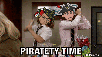Two Men Standing Together Saying Pirate Time GIF