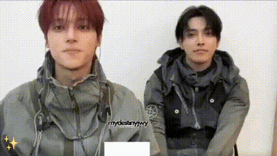 Two Men Standing Together GIF