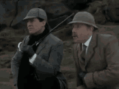 Two Men Standing With Blazing Talent Text GIF