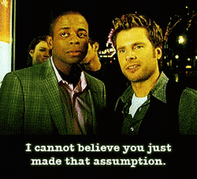 Two Men Standing With Caption I Cannot Believe You Just Made That Assumption GIF