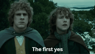 Two Men Standing With First Yes GIF