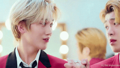 Two Men Standing With MJ The Snowman GIF