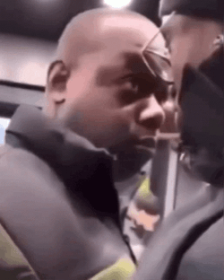 Two Men Stare Each Other GIF