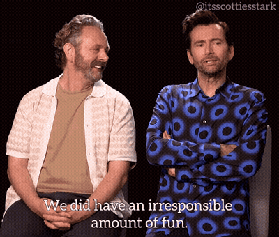 Two Men Talking About Fun GIF