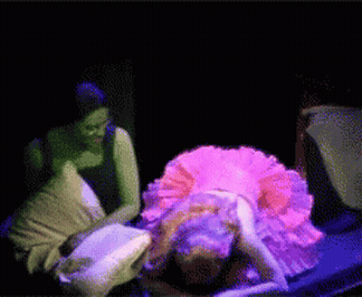 Two Men Talking At Bar GIF