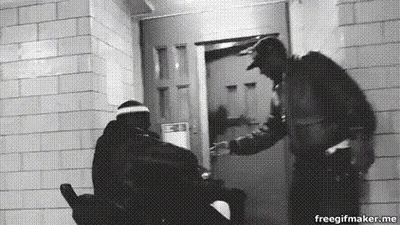 Two Men Talking At Door GIF