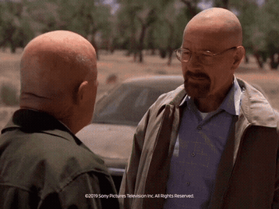 Two Men Talking In Front Of Car Sony Pictures Television GIF