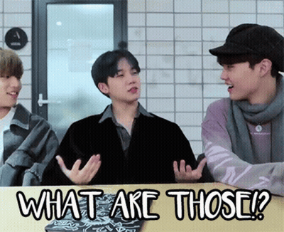Two Men Talking In Hallway GIF